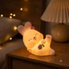 Cute rose bunny night lamp on bedside table
